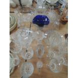 A selection of clear cut and colour glass wares including blue glass