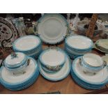A dinner service by Mintons in 19th century turquoise rim design