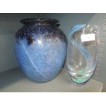 An art glass vase with blue swirl and similar