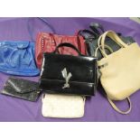 A small selection of vintage and modern handbags.