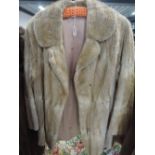 A vintage short fur coat, good condition, approx medium in size.