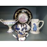 Three Booths cabinet cups and saucers in The Worcester Scale pattern, a matching miniature teapot, a