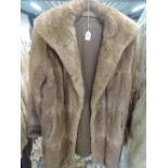 A vintage 1950s mink coat having monogrammed lining(EHJ) great condition.