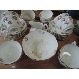 A part tea service by Hammersley hand decorated design