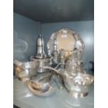 A selection of silver plate including salver, caster, wine coaster, sauce boats, ladles etc