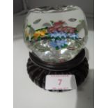 An art glass paper weight having cut sides flower design and makers cane marked C possibly Clichy
