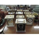 A selection of carriage clocks with various designs and styles