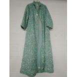 A quilted dressing gown in a 1960's design