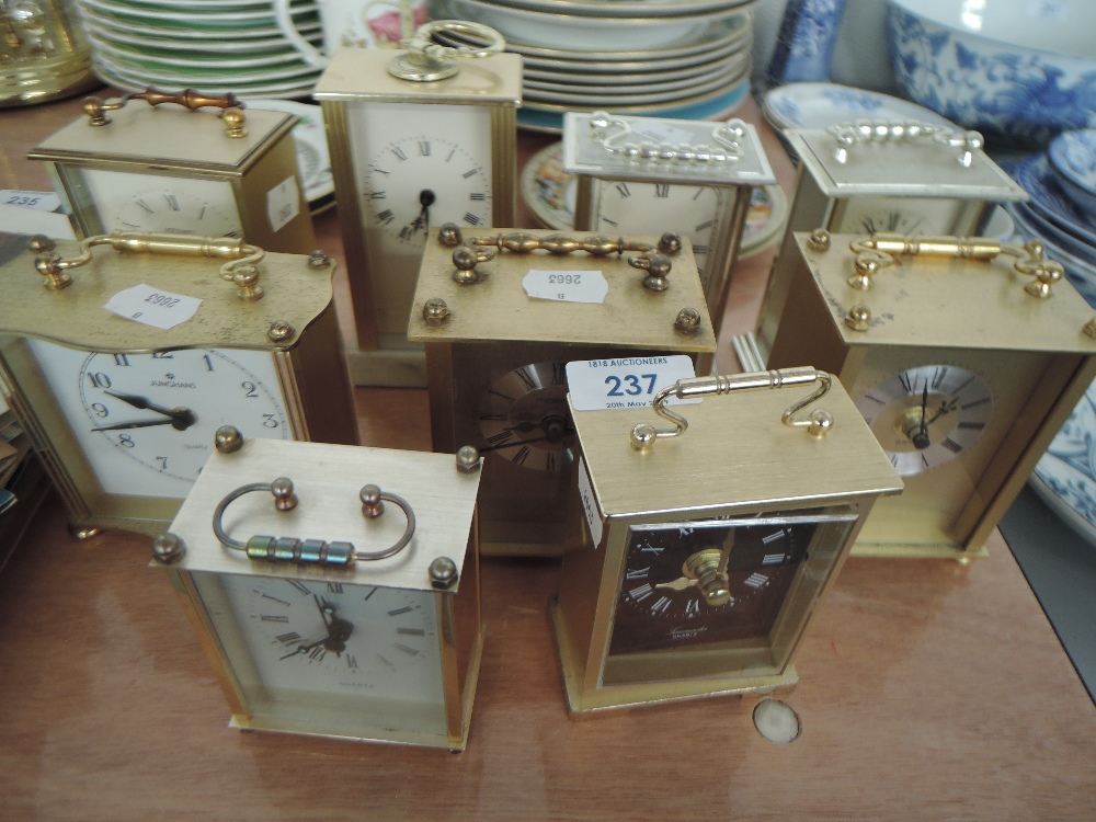 A selection of brass bodied style carriage clocks various style and designs