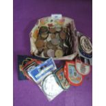 A selection of collectable currency and sew on travel patches