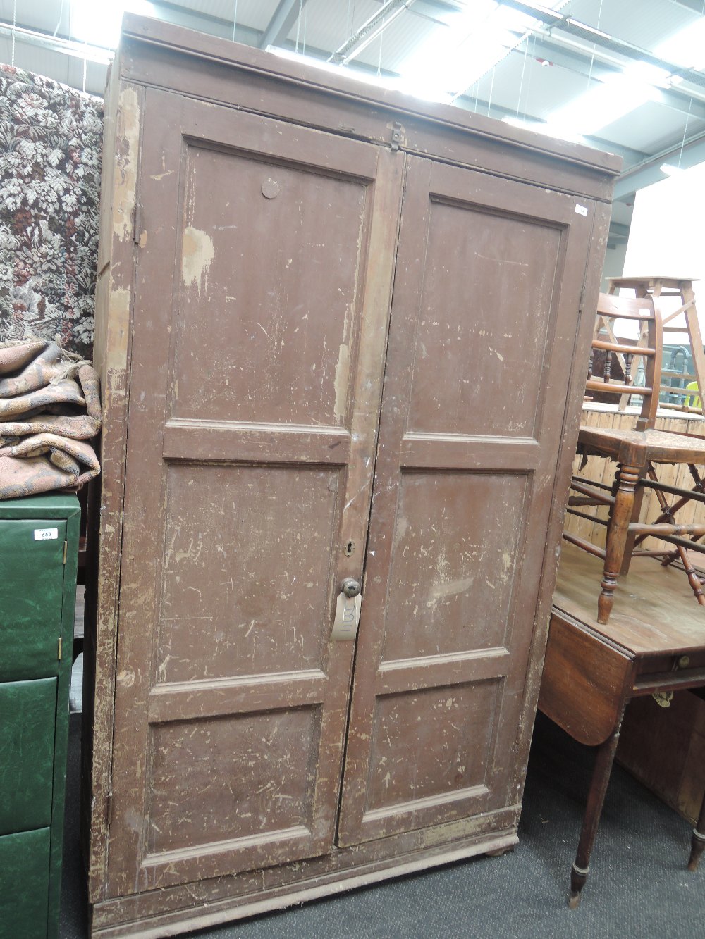 A rustic pine tool cabinet