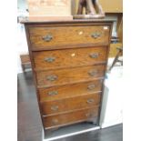 An early to mid 20th Century oak chest of 6 long drawers