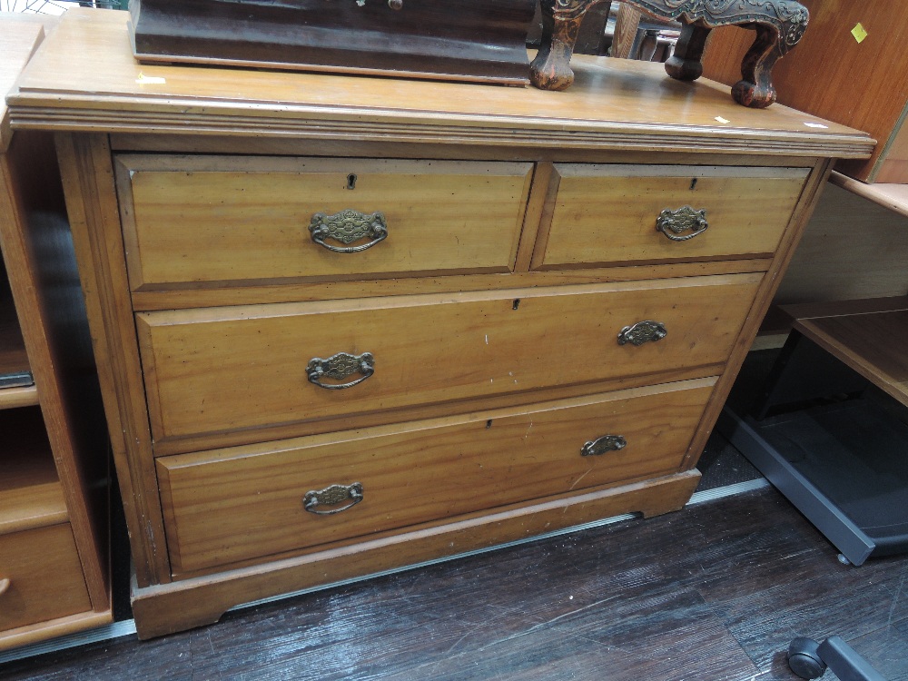 A 19th Century satinwood bedroomn chest of two over two drawers