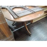 A reproduction Regency extending dining table