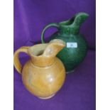 Two early 20th century water jugs