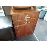 A vintage teak or sapele office cabinet