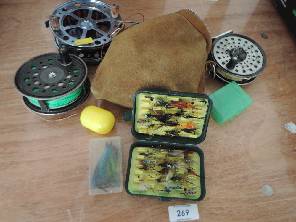 A selection of fly fishing reels and lures