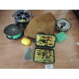 A selection of fly fishing reels and lures