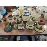A selection of ceramic Torquay wares including candle stick