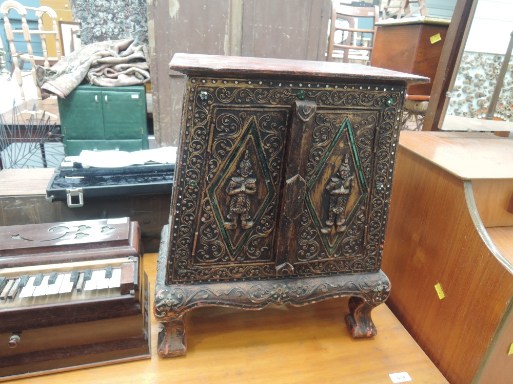 A vintage Asian low cabinet