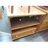 A teak effect TV cabinet