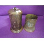 Two early 20th century tea canisters with tooled designs