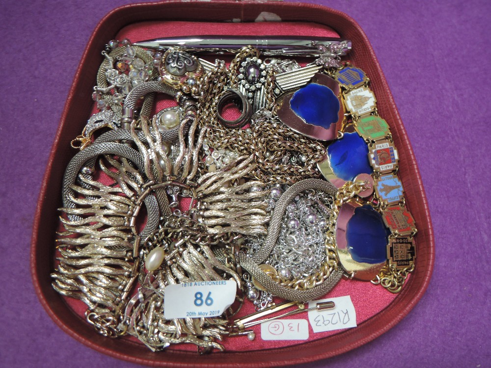 A selection of metal costume jewellery including necklaces and bracelets etc
