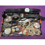 A selection of costume jewellery and wrist watches including Casio, Roamer and Sekonda