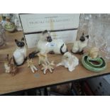 A selection of figures and figurines including Beswick cat