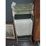 A pair of vintage metal folding garden chairs