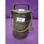 A small galvanised milk or dairy container