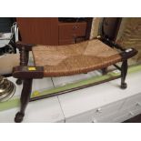 A vintage woolwinder style stool