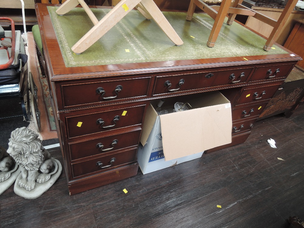 A reproduction Regency style pedestal desk