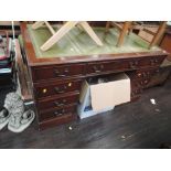 A reproduction Regency style pedestal desk