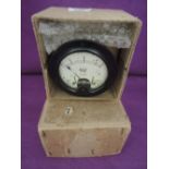 An amp or similar volt meter bearing the military stamp dated 1944 and in original box