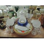 A selection of tea cups and saucers and tea pots