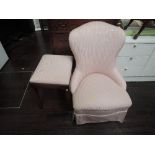 A vintage nursing chair and similar dressing table stool, in stripy pink upholstery