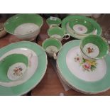 A part dinner service with hand decorated floral designs