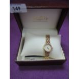 A lady's gold plated wrist watch by Rotary having Roman numeral dial and bracelet strap, with case