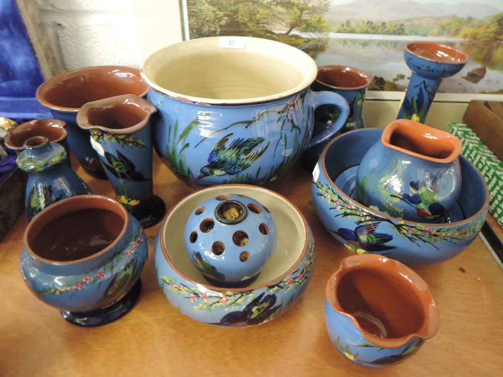 A selection of motto ware ceramics from Torquay with blue glaze and Kingfisher design