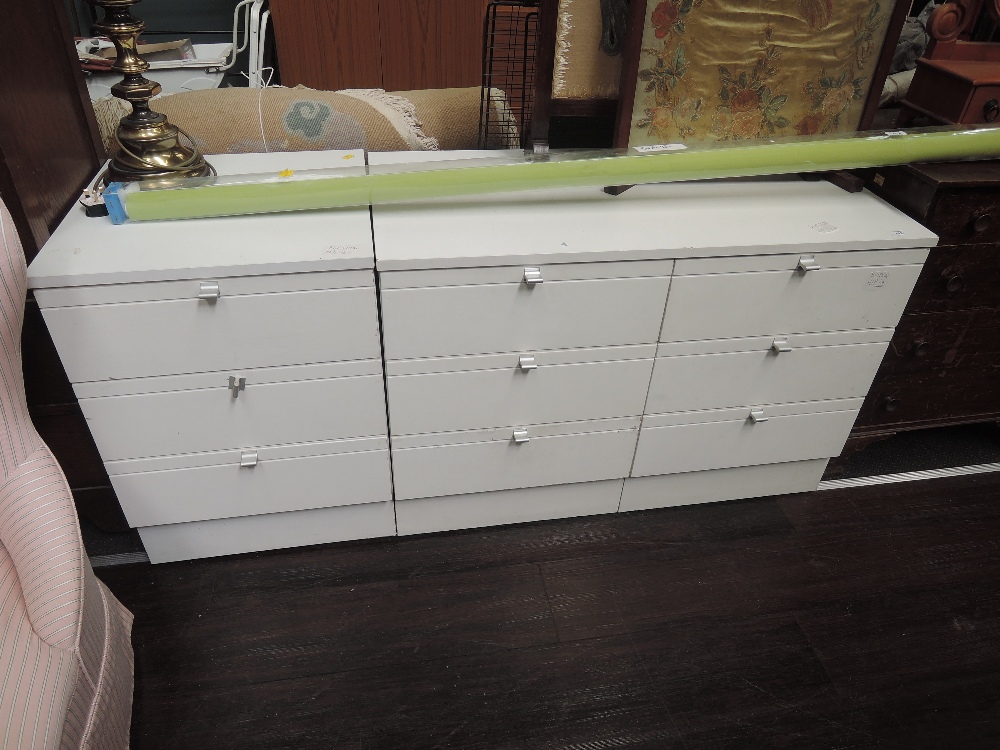 Two vintage white laminate bedroom chests