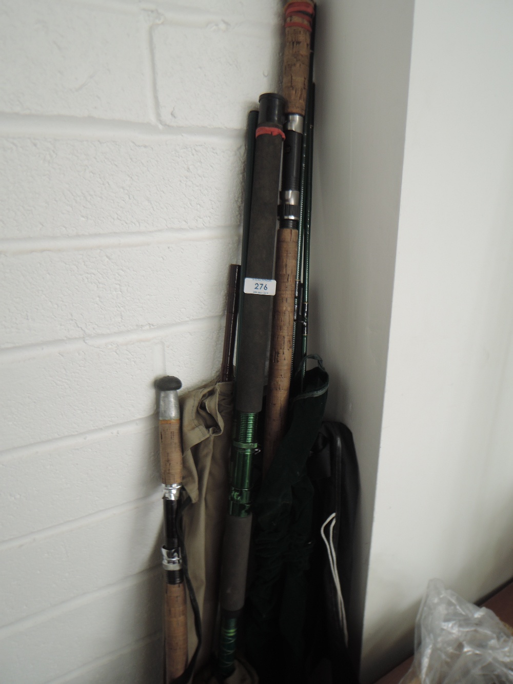 A selection of assorted fishing rods including Shakespear