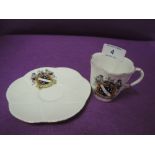 A fine ceramic tea cup and saucer by Shelley with hand detailed Letchworth family crest badge