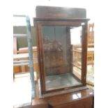 An early 20th Century mahogany confectionery shop display cabinet, labelled TB Ford, Loudwater ,