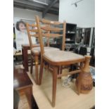 A pair of vintage kitchen chairs