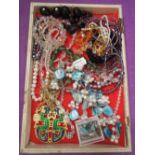 A small selection of costume jewellery including crystal beads, mineral pendants, freshwater pearl