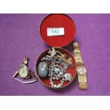 A small trinket box containing two lady's gold plated watches, diamante necklace and earrings, HM