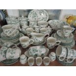 A part tea and dinner service in an Arthur Wood style