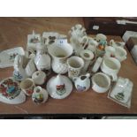 A selection of crested wares including Goss and Scottish thistle design