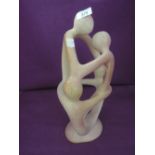 A soap stone style carved African figure